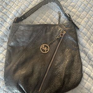 Michael Kors handbag - never used with one big front zipper & one inside.